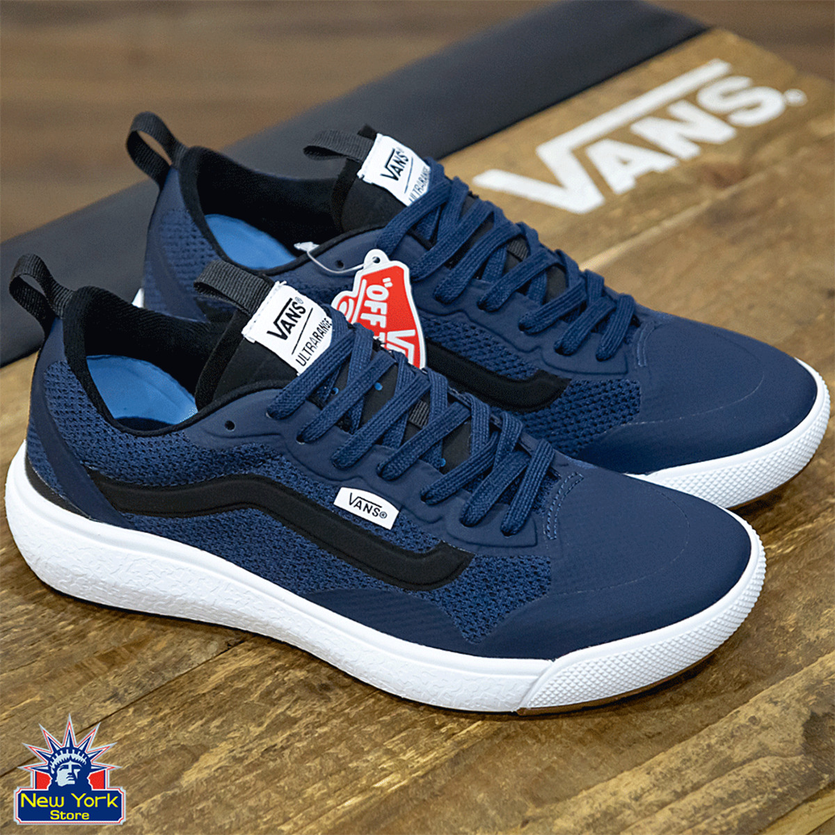 Vans azules y negras best sale